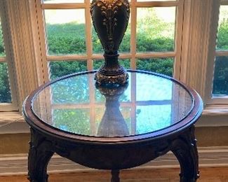 Mirror-top Queen Anne Side Table and Table Lamp.Pair of Tan Armless with Scrolled Top Occasional Chairs and Mirror-top Carved Mahogany Lamp Table and Table Lamp.