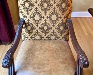 The Dining Room Table and 8 Chairs.  The Dining Room Table was Custom Made from Honquest Furniture in Barrington, IL.  2 Captain Chairs and 6 Dining chairs with Leather Seats.    The Table is absolutely Beautiful with double pedestal legs.