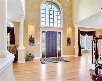 Beautiful Bartlett 2-Story Foyer with Curved Staircase greets you on entry to the home!