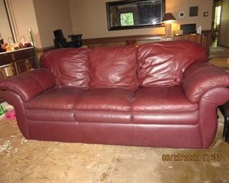Leather sofa (needs cleaning..has a little paint on it)