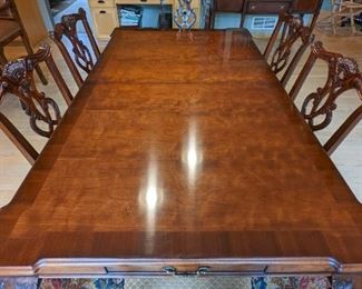 Gorgeous Henredon Dining Table Set. Beautiful and intricate detailed claw foot table! Includes four additional chairs pictured separately. The table measures 45.5” x 75” and 29” high