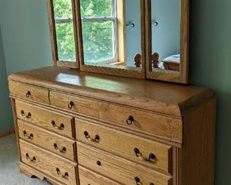 Lovely Mirrored Dresser. This item matches the previous lot. There are scratches/marks on the top that can be seen in the photos.

Measures 66” wide, 16” deep and 80” high