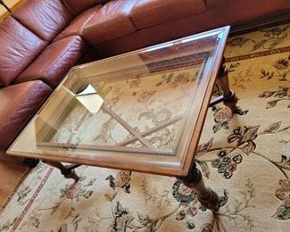 Glass framed cocktail table 48 by 31 $250