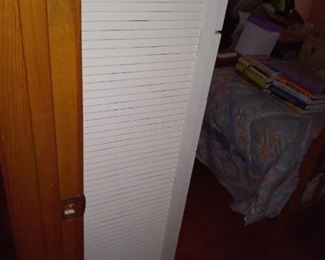 Side of tall chest of drawers