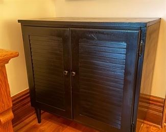 BIN$200. Antique, Mid Century style hard wood storage cabinet, black, 29" x 17" x 30"