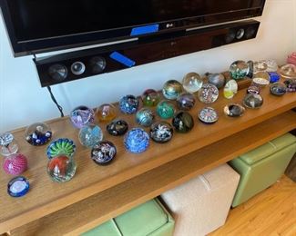 Assorted artisan paperweights; some signed. Featured artists include: Michael Harris, Galway, Caithness, Selkirk, Eickholt, Gentile, Baccarat, Orient & Flume, The Glass Forge, Correia, Peter Patterson, Orrefors and Webb Thomas