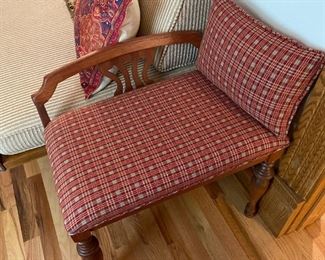 BIN$70. Wood-carved upholstered bench with matching pillow.