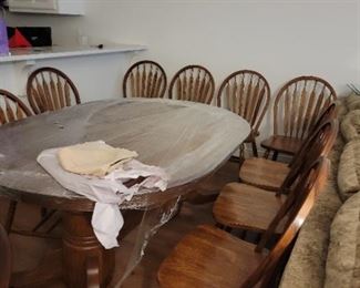 Formal dinning table with 12 chairs and 2 leaves $1200.00