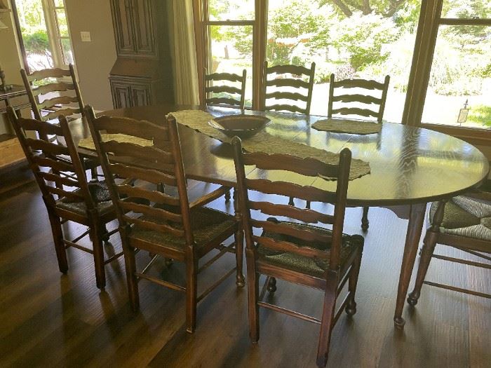 . . . WOW! a Pine Shop harvest table with ladder back chairs with rush seats -- outstanding!