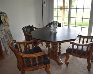 Game Table with 2 Leaves and 4 Barrel Chairs with Casters