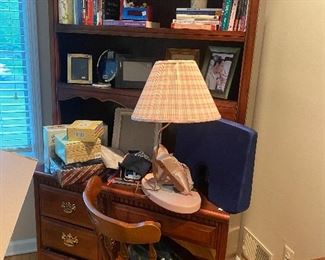 Desk with hutch and chair 
Books, ballerina lamp and other items 

