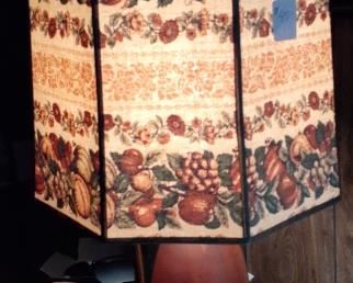   Hand turned wood base with vintage lampshade. There is a pair