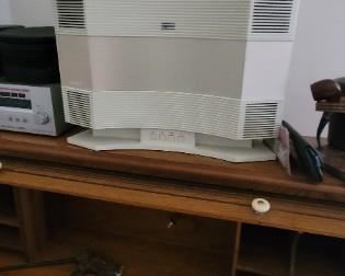 Several Bose items, including VCR/DVD/RADIO combo, earphones, separate radio, speaker