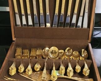Gold-toned stainless steel flatware, serving utensils & case