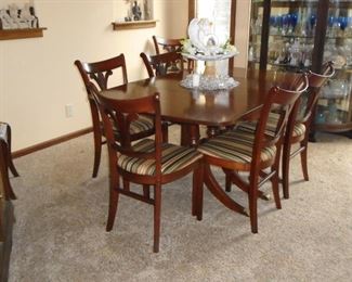 Cherry drop leaf dining room table with 6 chairs