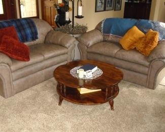 2 leather love seats