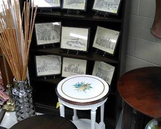 Framed prints of Virginia Beach historical sites, white painted side table