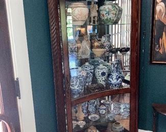 Lot 76  Cherry Finish Corner Curio Cabinet   300