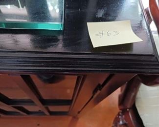 Lot 63  Ebony finish 2 door Cabinet  150