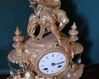 Lot 73  Gilt finish French Figural Clock  100