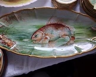 Lot 96 Limoges fish set with platter and plates  300 set