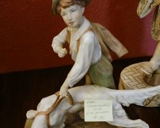 Lot 141  Royal DUX porcelain figure boy/dog   175