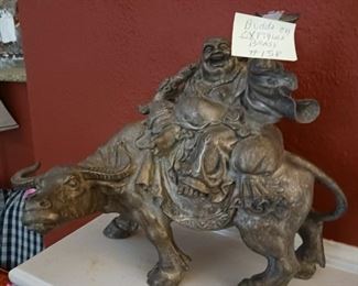 Lot 158  Brass Budda on OX     60