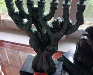 Lot 585  Bronze sculpture Men in arms   200