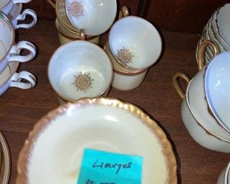 Lot 731 set of Limoges Gilt Demi Cups saucers   30 all