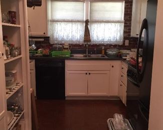 Packed kitchen - Le Creuset, Cuisinart Kitchen-Aid and much more.