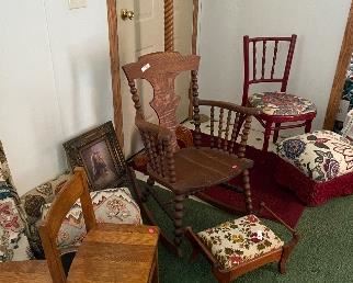 Several antique oak chairs