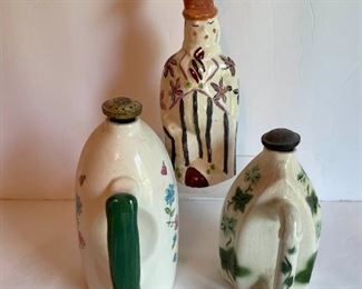 Antique Laundry Sprinklers of Man and 2 Irons