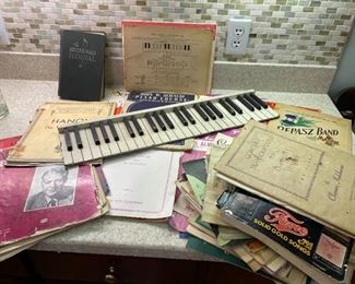 The Diller Practice Keyboard 1930s with Various Sheet Music