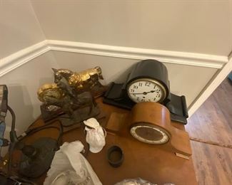 Antique clocks and lamps.