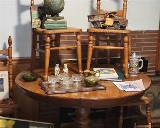 Pedestal table with 4 matching ladder back chairs 