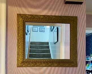 Antique rectangular mirror with gesso frame.