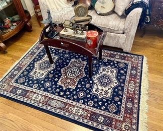 Bombay Company butler tray table & navy blue traditional rug.