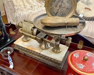 Antique scale and brass items.