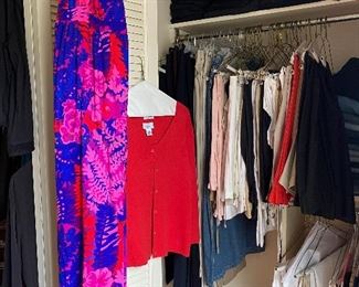 One of several closets FULL of women's clothes.  size small to large.