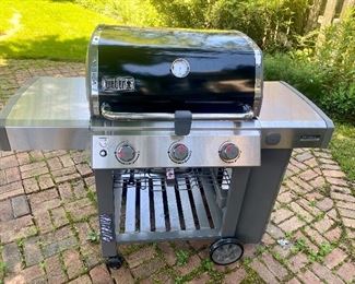 Like new (seriously)!!!! Weber gas grill with cover.