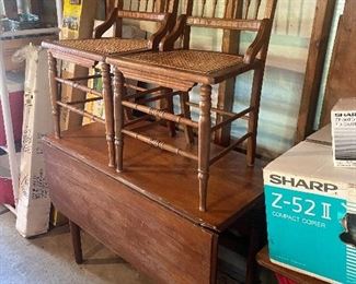 Drop leaf table & vintage wood chairs.