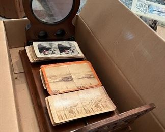 Antique stereoscope with stereoscope cards