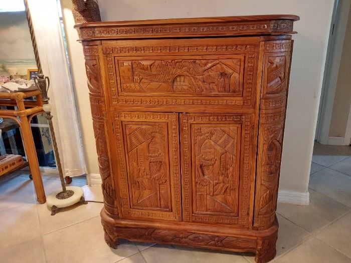 Hand carved bar with great hidden storage for accessories 