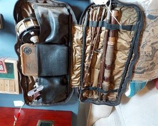 Antique rod and reel in bag