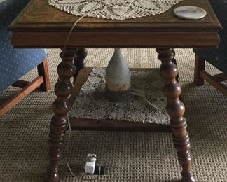 Parlor table with beautiful turned legs. 