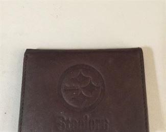 A Steelers leather wallet, slim enough to carry; great details for display. 