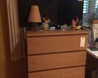 Chest of drawers with lots of storage space. The flat screen TV is also available. 