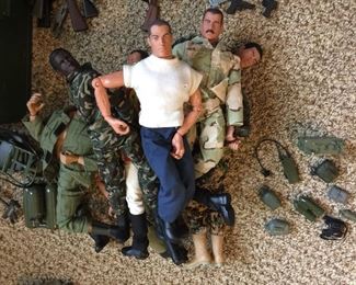 Some of the 18 GI Joe action figures and accessories in the collection. 