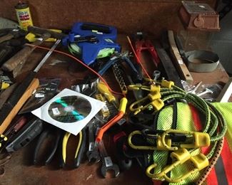 Hand tools, a how-to CD, stretchy cords, safety vest and a big variety of garage finds with lots of life left. 