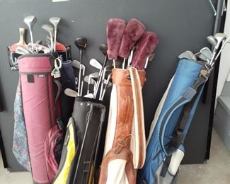 4 sets of golf clubs with bags - $25 each